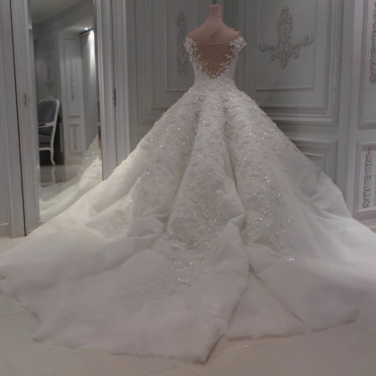 Sweetheart Ball Gown Wedding Dresses With Illusion..