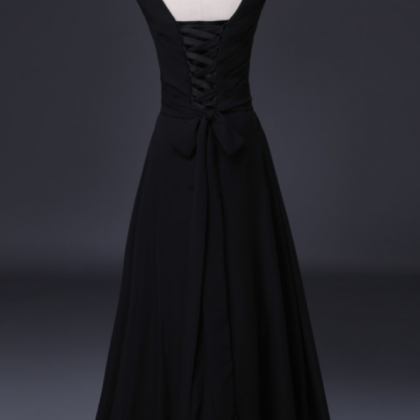 The Black Ball Gown Was A Formal Evening Dress..
