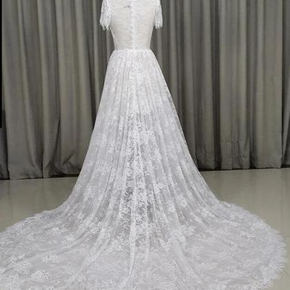 Beautiful Lace Short Sleeves See Through Wedding..