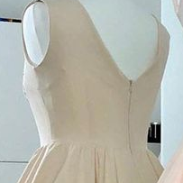 Champagne Sleeveless Ruched Homecoming Dress With..