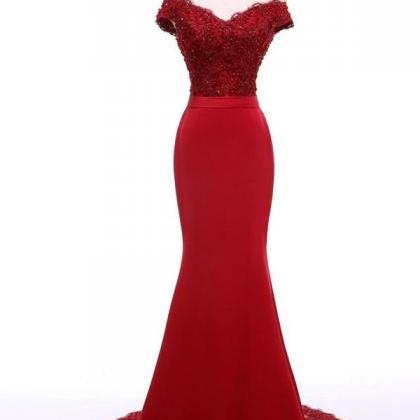 Red Floor Length Mermaid Prom Dress Featuring Lace..