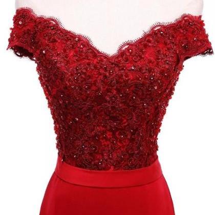 Red Floor Length Mermaid Prom Dress Featuring Lace..
