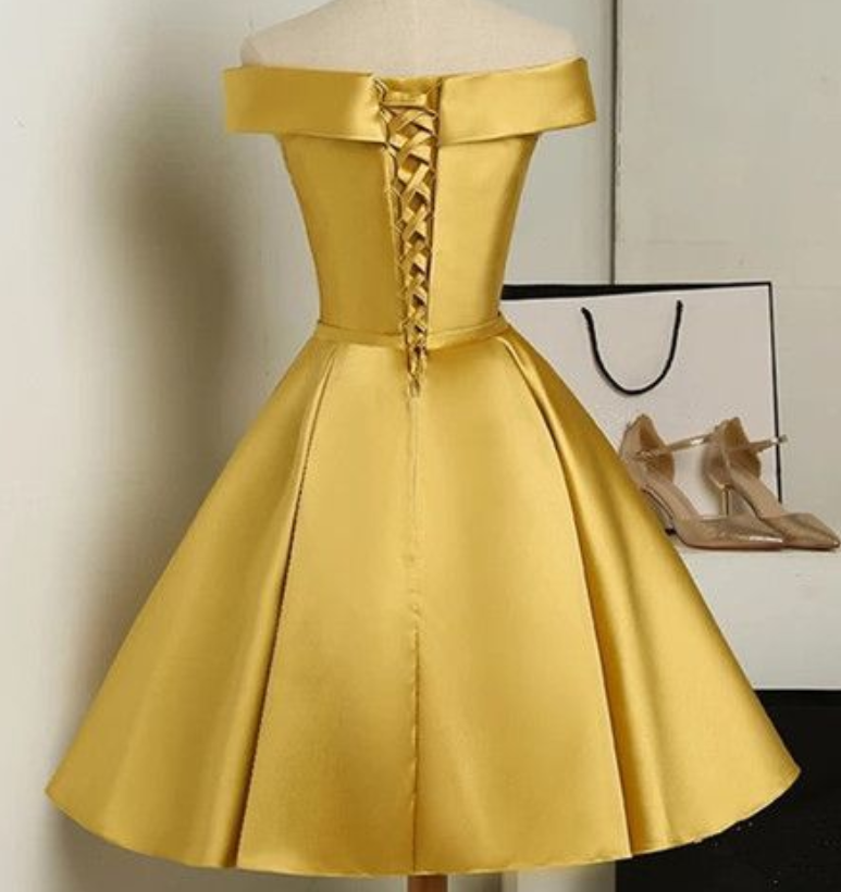 Gold Satin Offtheshoulder Short Ruffled Skater Dress Featuring Bow Accent Belt And